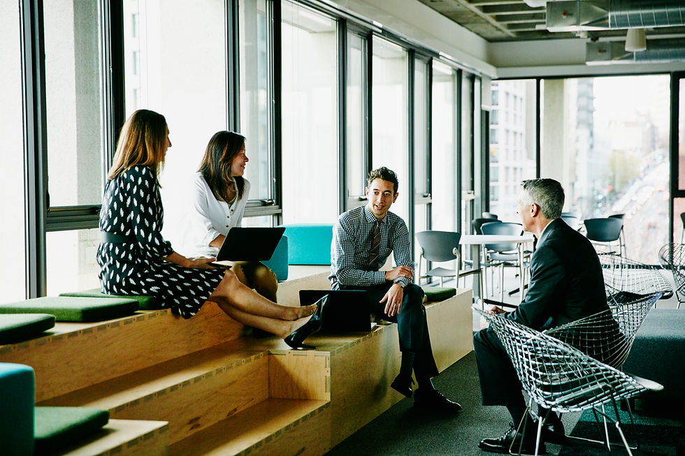 Eye-level view of a counseling team meeting around a table